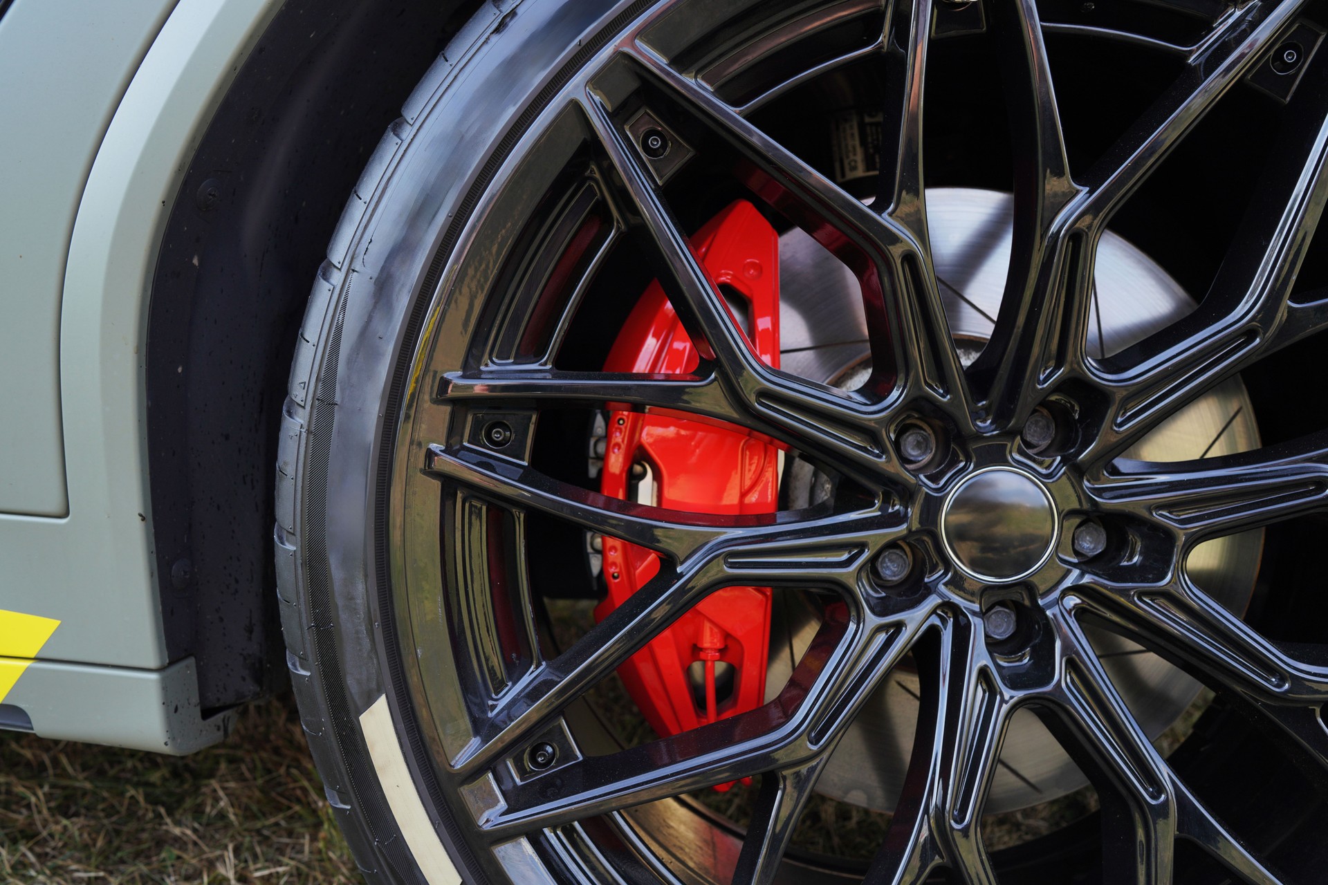 Alloy wheel with calipers and racing brakes of the sport car.